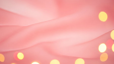 With showing soft pink fabric draped with out of focus golden yellow bokeh lights keywords: soft, pink, fabric,...の写真素材
