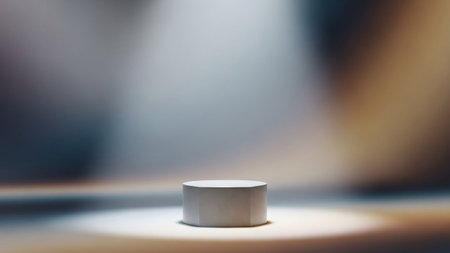 A minimalist white hexagonal podium is softly illuminated by spotlights against a blurred neutral background,...の写真素材