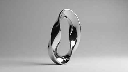 Shiny showing shiny metallic abstract sculpture with a twisted mobius strip form and smooth reflective surface.の写真素材