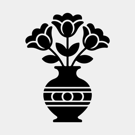Simple black and white silhouette of flowers in a vase.のイラスト素材