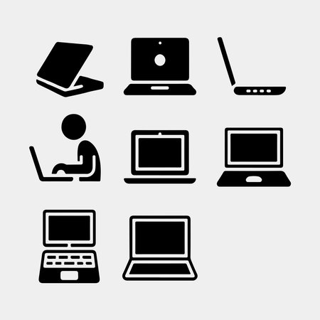 Vector Icons of Open and Closed Laptops and a User Workingのイラスト素材