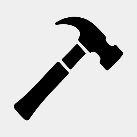 Simple Black Silhouette of a Hammerのイラスト素材