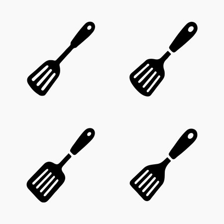 black and white cooking spatula iconsのイラスト素材