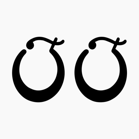 Stylish hoop earrings solid icon for fashion design, jewelry branding, accessories stores and professional illustrationのイラスト素材
