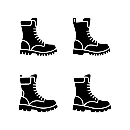 A collection of solid combat boot icons presented individually on a clean white background, perfect for various design applications.のイラスト素材