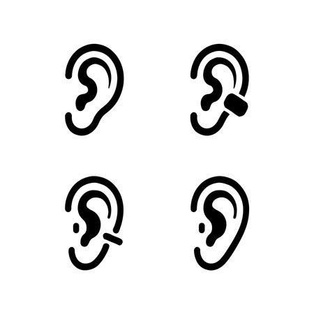 A set of solid ear cuff icons, showcasing various designs and styles, presented isolated on a clean white background.のイラスト素材