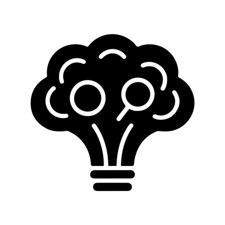 A solid icon representing brainstorming and ideas, featuring a lightbulb, isolated on a clean white background.のイラスト素材