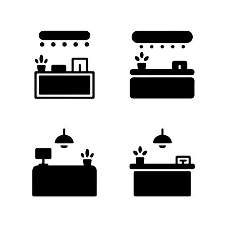 A collection of solid reception desk icons presented as a single graphic element isolated on a clean white background.のイラスト素材