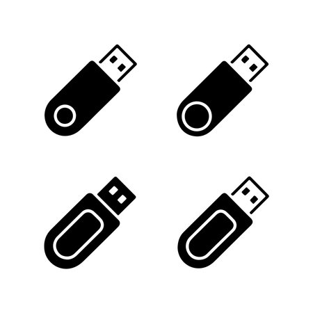 A collection of solid icons representing USB flash drives, presented individually on a clean white background.のイラスト素材