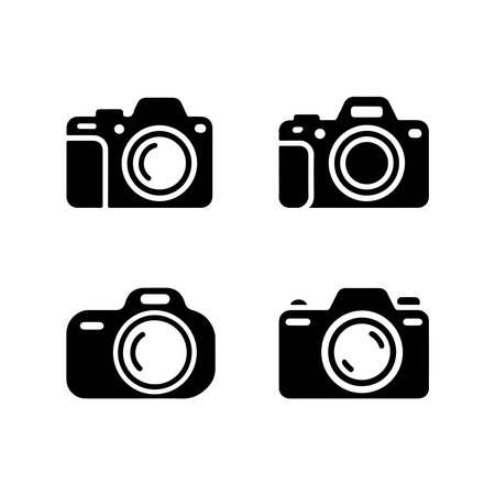 A collection of solid icons representing DSLR cameras and photography equipment, presented isolated on a white background.のイラスト素材