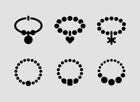 Charm and Beaded Bracelets Icons solid icon set.Bold solid icons featuring detailed charm and beaded bracelet elementsのイラスト素材