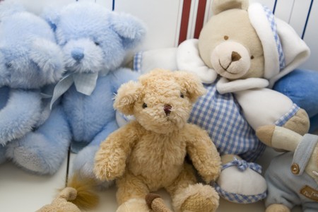 Close-up of stuffed toys on the bedの写真素材