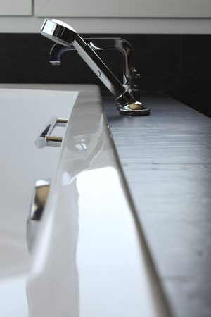 Close-up of faucets in the bathroomの写真素材