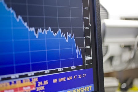 Financial graph being displayed on a computer monitor, Madrid, Spain