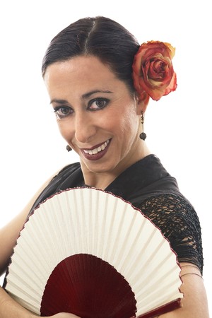 Typical spanish gypsy with carnation and fanの写真素材