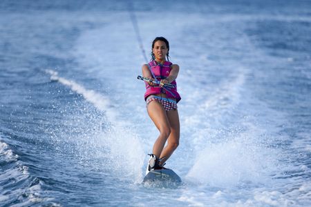 Female teenager wake boardingの写真素材
