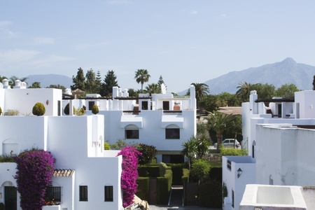 Residential in Marbella. Typical houses painted in white.の写真素材