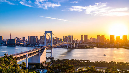 Rainbow Bridge and Tokyo cityscape at sunset, Tokyo, Japanの素材