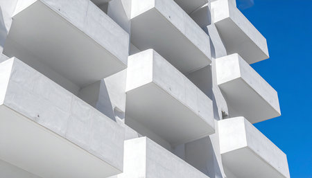 Modern architecture, detail of the facade of a modern building, blue skyの素材