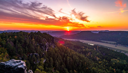 Sunset over the Saxon Switzerland National Park in Saxony, Germanyの素材