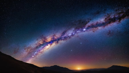 Milky Way over the mountains. Starry sky with stars and nebulaの素材