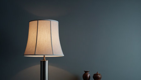 Table lamp on dark wall background with copy space for your text.の素材