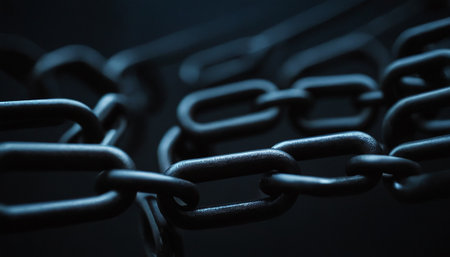 Close up of chain links on black background. Selective focus.の素材