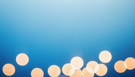 Abstract circular bokeh background of Christmaslight on blue background.の素材