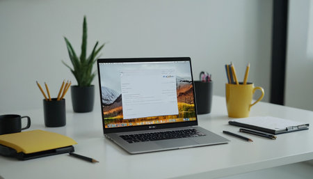 laptop screen with web site design on table at home office.の素材