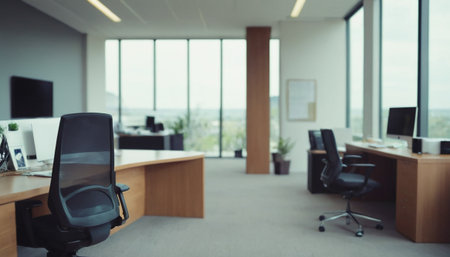 Modern office interior with furniture and equipment. Blurred background, selective focusの素材