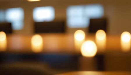 Blurred background of coffee shop with bokeh defocused lightsの素材