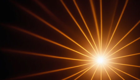sunset on a black background with rays of light and lens flareの素材