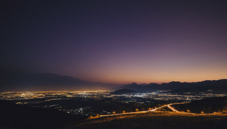 Night view of the mountains and the city lights. Long exposure.の素材