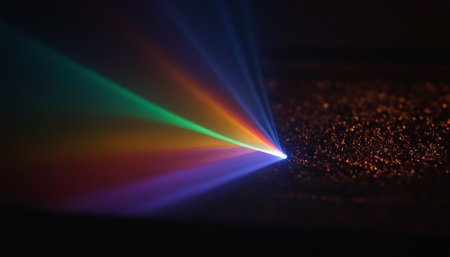 Colorful laser rays on black background. Laser rays in dark room.の素材