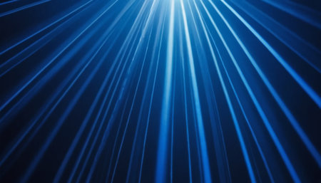 blue rays of light on a dark blue background, abstract background.の素材