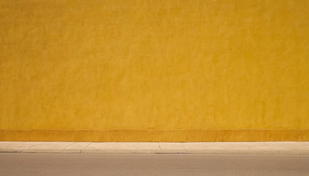 yellow wall texture background with copy space for add text or image.の素材