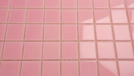 Pink ceramic tile wall and floor for background and texture. Close up.の素材