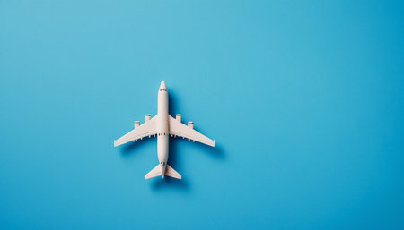 airplane model on a blue background. minimalism. travel conceptの素材