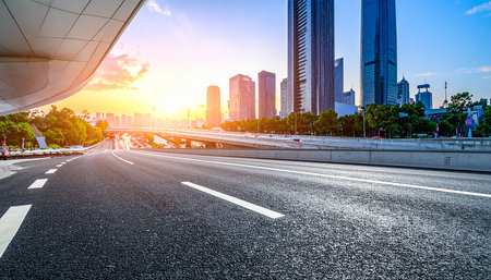 Asphalt road and modern city skyline with buildings in Shanghai,China.の素材