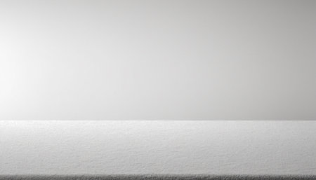empty top of white table isolated on grey background. For product displayの素材