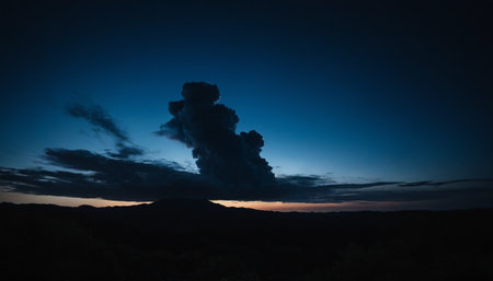 Silhouette of a volcano on a background of blue sky.の素材