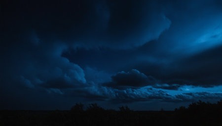 Dramatic dark stormy sky with rain clouds. Dramatic dark stormy sky backgroundの素材