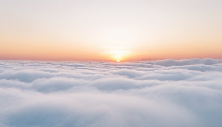 Sunset above the clouds. Panoramic view of the cloudscape.の素材