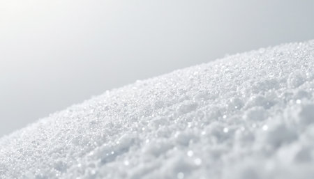 Close-up of white snow. Abstract winter background with snowflakesの素材