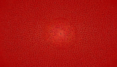 Red abstract background with small holes in the form of a circle.の素材