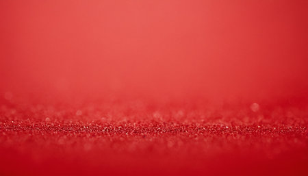 Red glitter background with bokeh defocused lights and copy spaceの素材