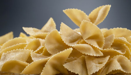 close up of a raw uncooked italian pasta farfalleの素材
