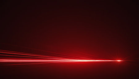 Red light flare on black background. Abstract background for your design.の素材