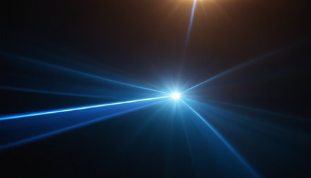 Lens flare effect in space. Abstract rays of light on a black background.の素材