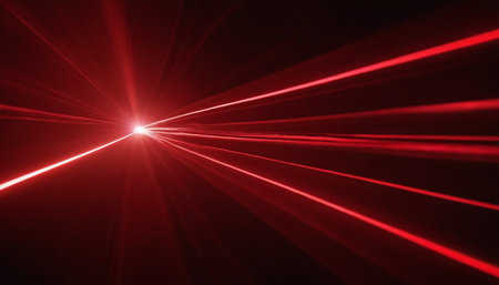 Red light from the sun on a black background. Rays of lightの素材